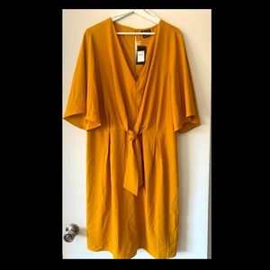 Citi Chic Size L (20).  Mustard yellow Knot front dress.  Net
